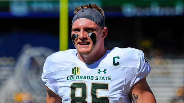 Colorado State tight end Trey McBride warms up before game